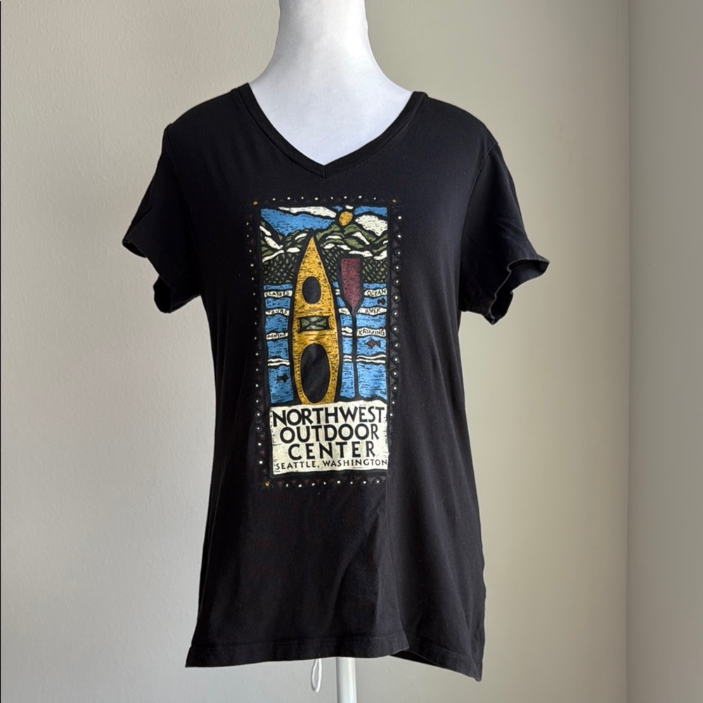 District Made women’s black v-neck, capped sleeve teeshirt